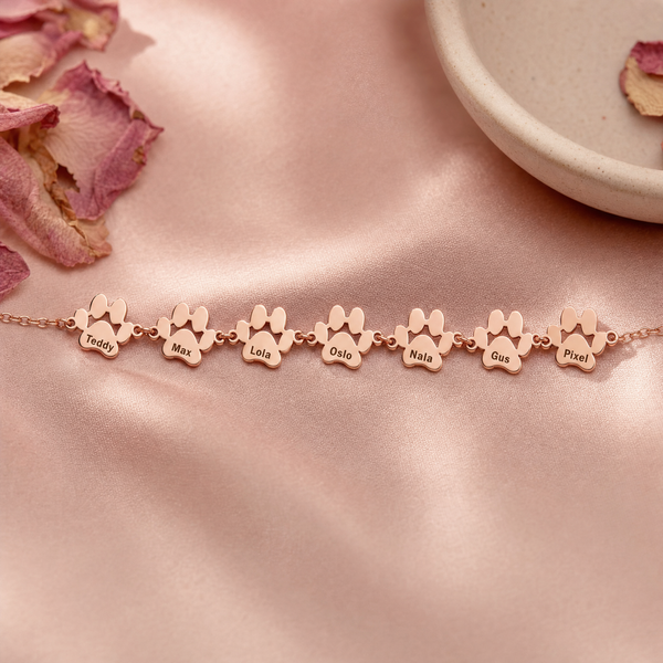 Bracelet Câline finition or rose, 7 pattes gravées